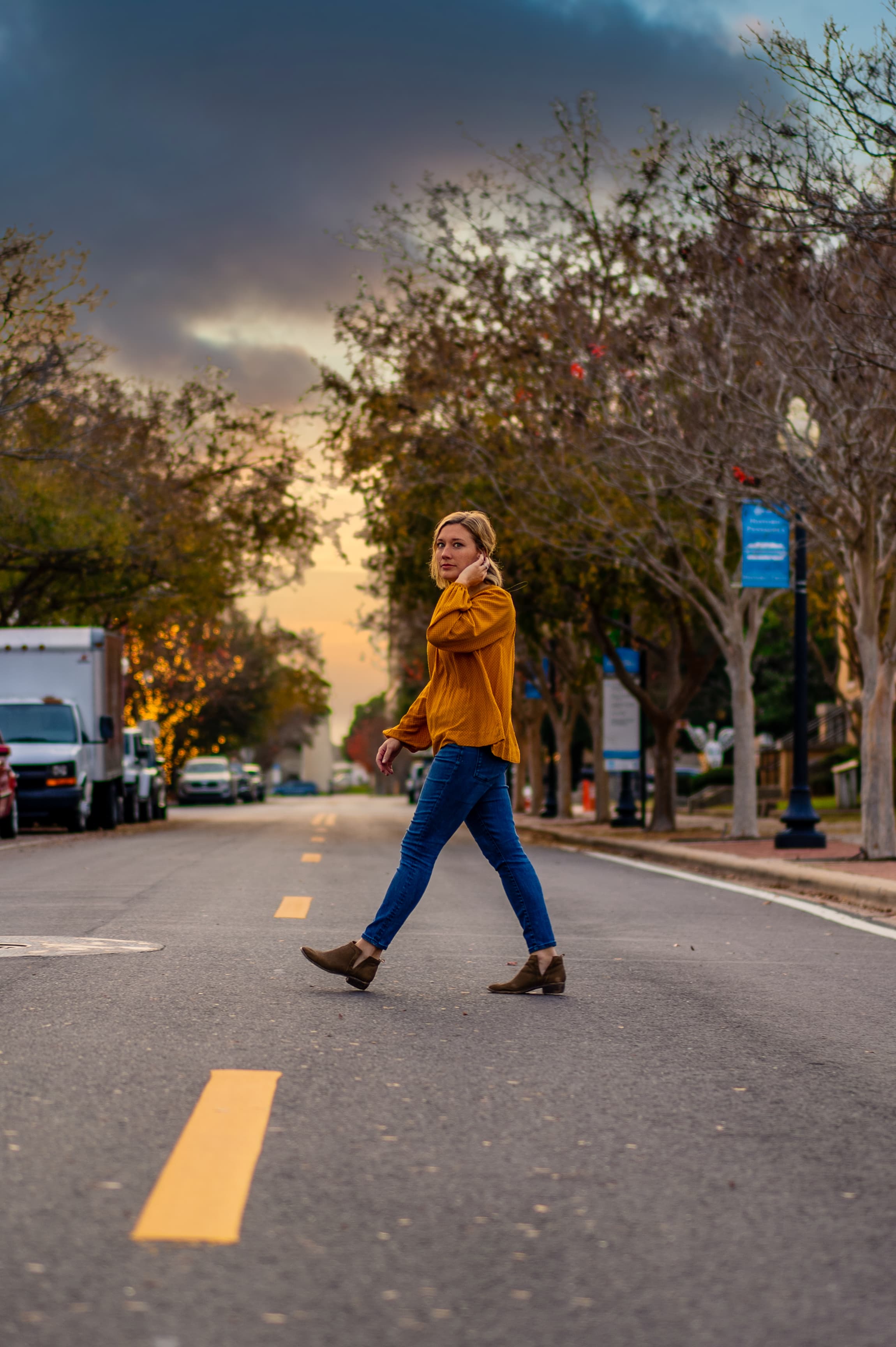 Christine Wessa walking across the street in Pensacola, FL